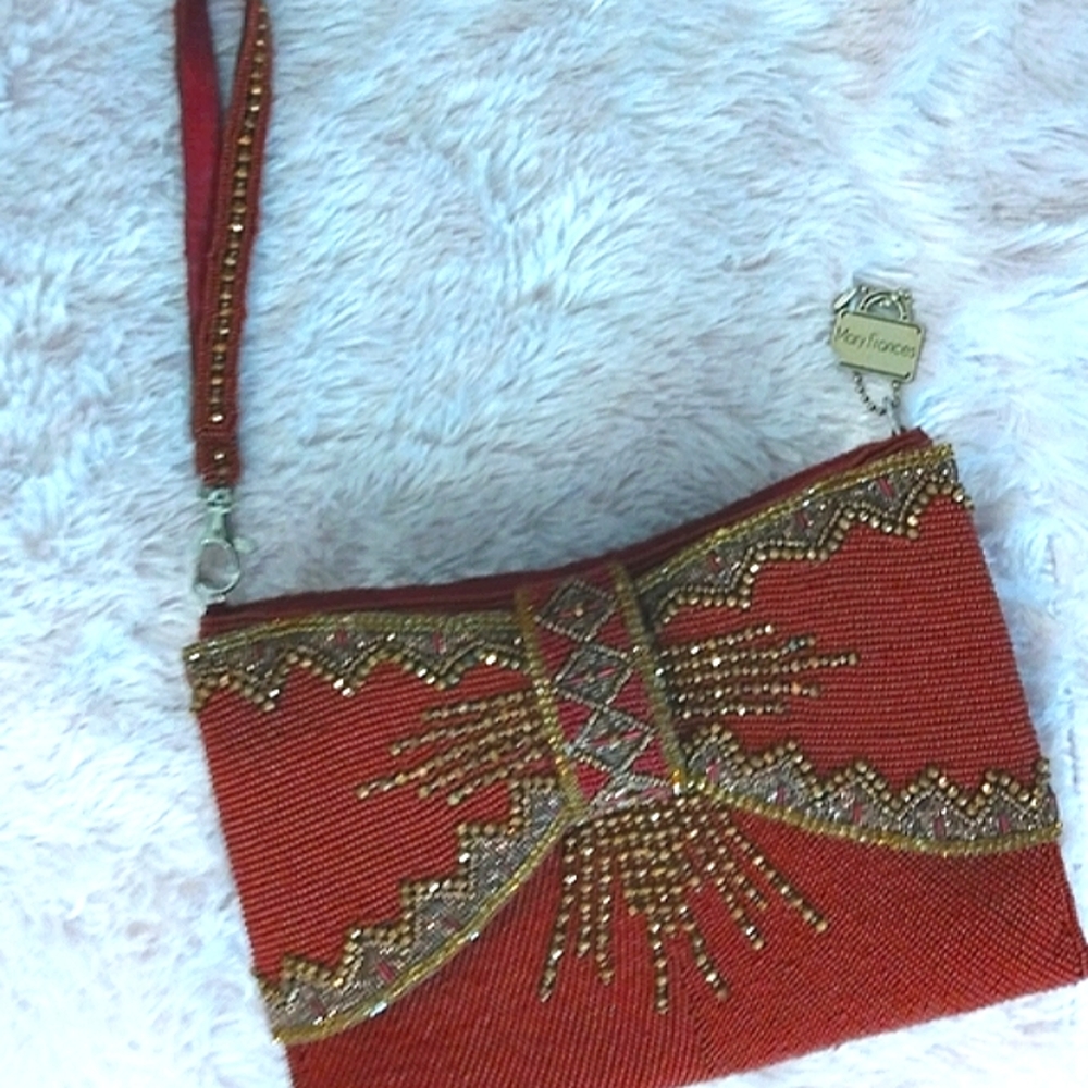 Mary Frances embroidered wristlet   bag